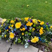 Yellow and Purple Casket Spray 